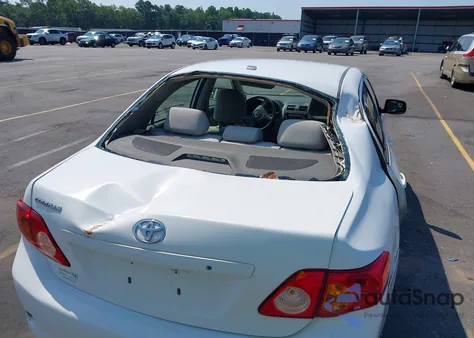 2009 Toyota Corolla из США, поврежденный, VIN 1NXBU40E69Z090434